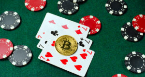 https://www.vecteezy.com/photo/70699055-three-playing-cards-are-prominently-displayed-with-a-bitcoin-chip-on-top-surrounding-them-are-poker-chips-in-red-black-and-white-creating-a-vibrant-gaming-atmosphere