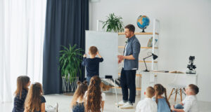 https://www.vecteezy.com/photo/8362532-using-whiteboard-group-of-children-students-in-class-at-school-with-teacher