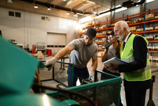 https://www.freepik.com/free-photo/two-workers-showing-quality-control-inspector-industrial-machine-they-are-using-distribution-warehouse_25856174.htm#fromView=search&page=1&position=5&uuid=8cb2a81e-c12b-45a7-b9d5-0cc71c9b8bd9&query=workers