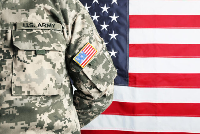https://www.freepik.com/premium-photo/male-army-soldier-american-flag-background_90242587.htm#from_element=cross_se
