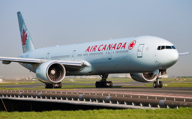 https://www.vecteezy.com/photo/27556823-air-canada-boeing-777-300er-c-fivs-passenger-plane-arrival-and-landing-at-paris-charles-de-gaulle-airport