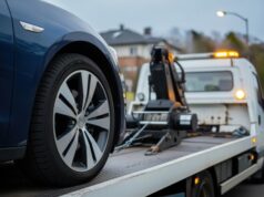 https://www.vecteezy.com/photo/73222726-blue-vehicle-wheel-being-loaded-onto-a-white-flatbed-tow-truck-for-roadside-assistance