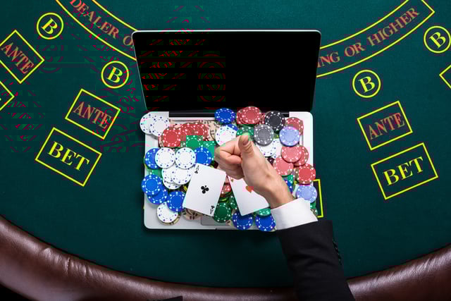 https://www.vecteezy.com/photo/35180871-casino-online-gambling-technology-and-people-concept-close-up-of-poker-player-with-playing-cards