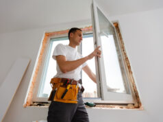 https://www.vecteezy.com/photo/35483645-male-industrial-builder-worker-at-window-installation-in-building-construction-site