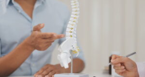 https://www.vecteezy.com/photo/49307100-orthopedists-holding-digital-tablet-and-pointing-at-model-concept-of-osteoporosis-back-pain-lumbar-chiropractic-and-health