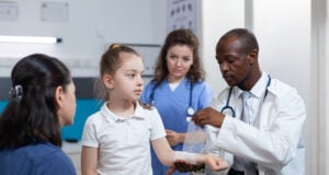 Children Urgent Care as a Frontline Healthcare Solution https://www.freepik.com/free-photo/african-american-pediatrician-doctor-bandage-broken-bone-young-child-arm_20362727.htm#fromView=search&page=1&position=11&uuid=ff249cbe-aad5-4550-a599-7e97afa7b030&query=children+doctor