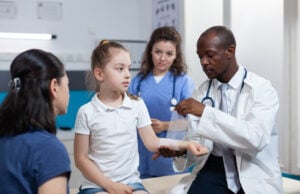 Children Urgent Care as a Frontline Healthcare Solution https://www.freepik.com/free-photo/african-american-pediatrician-doctor-bandage-broken-bone-young-child-arm_20362727.htm#fromView=search&page=1&position=11&uuid=ff249cbe-aad5-4550-a599-7e97afa7b030&query=children+doctor
