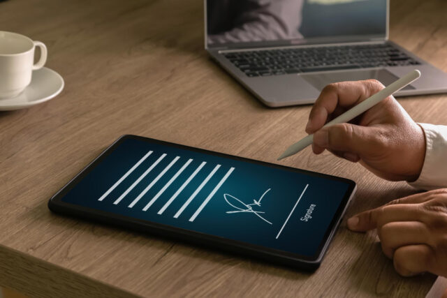 9232 https://www.freepik.com/premium-photo/businessman-electronic-signing-document-tablet-with-stylus-laptop-representing-secure-e-signature-contract-approval-signs-paperless-workflow_426310117.htm#fromView=search&page=1&position=11&uuid=5467c684-1272-490b-b57f-7e7a5ece1f8c&query=electronic+document+signing