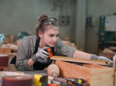https://www.vecteezy.com/photo/53479290-a-woman-working-in-a-woodworking-shop