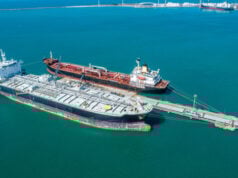 https://www.vecteezy.com/photo/7465946-aerial-top-view-of-fuel-tanker-ship-at-the-port-oil-terminal-is-industrial-facility-for-storage-of-oil-and-gas-petrochemical-products-ready-for-transport-to-further-storage-facilities