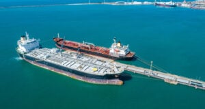 Global Energy Markets Bracing for Shockwaves Following U.S.-Israeli Strikes on Iran https://www.vecteezy.com/photo/7465946-aerial-top-view-of-fuel-tanker-ship-at-the-port-oil-terminal-is-industrial-facility-for-storage-of-oil-and-gas-petrochemical-products-ready-for-transport-to-further-storage-facilities