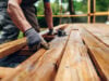 Outdoor Living in South Florida: How to Build a Deck That Survives Heat, Humidity, and Storm Season https://www.vecteezy.com/photo/70697329-carpenter-installing-wooden-planks-on-terrace-during-renovation