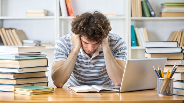 https://www.vecteezy.com/photo/49207865-the-student-looking-frustrated-or-stressed-with-a-messy-desk-filled-with-textbooks-notes-and-a-computer