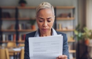 https://www.vecteezy.com/photo/72810234-woman-reads-documents-with-a-worried-expression-in-her-home-office