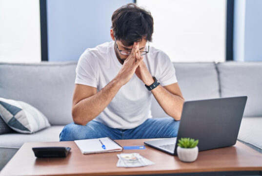 https://www.freepik.com/free-photo/young-hispanic-man-stressed-using-laptop-working-home_38414539.htm#fromView=search&page=1&position=23&uuid=e8b9ac08-d062-4354-ba9e-b92141c41bc2&query=financial+worries