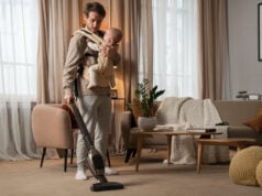 https://www.freepik.com/free-photo/full-shot-father-holding-baby-while-vacuuming_38050050.htm