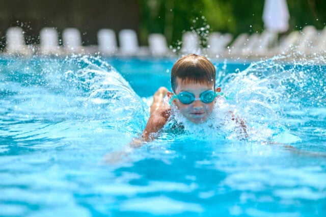 https://www.freepik.com/free-photo/boy-goggles-swimming-splashing-pool_31298356.htm#fromView=search&page=1&position=2&uuid=de172c09-c515-475b-95e2-e67f3f205d30&query=swimming