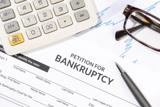 https://www.vecteezy.com/photo/21393817-bankruptcy-form-calculator-and-pen-on-desk-personal-injury-claim-form
