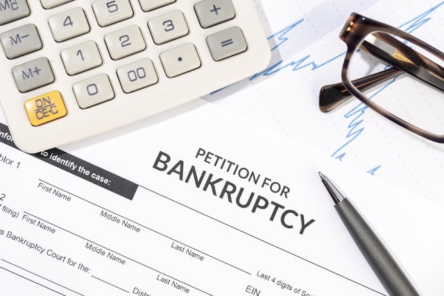 https://www.vecteezy.com/photo/21393817-bankruptcy-form-calculator-and-pen-on-desk-personal-injury-claim-form