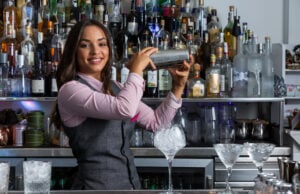 https://www.vecteezy.com/photo/6668947-cheerful-female-bartender-with-shaker-preparing-cocktail