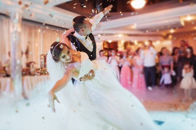 https://www.vecteezy.com/photo/6560159-happy-bride-and-groom-their-first-dance