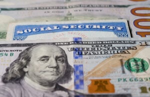 https://www.vecteezy.com/photo/45851575-photo-of-social-security-card-with-one-hundred-dollar-bills