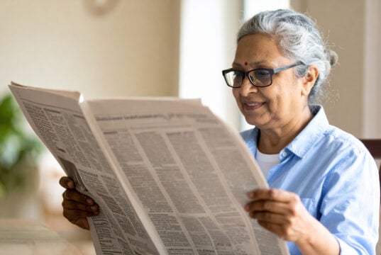 https://www.vecteezy.com/photo/69688740-senior-woman-with-gray-hair-and-glasses-reading-newspaper-indoors-smiling-and-enjoying-her-morning-in-cozy-home-setting-with-natural-light-and-plant-in-background