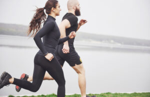 Are Carbs or Protein More Essential for Runners? https://www.freepik.com/free-photo/couple-jogging-running-outdoors-park-near-water-young-bearded-man-woman-exercising-together-morning_9276925.htm
