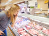 Meat Crisis Amidst Easing Inflation: A Tale of Two Aisles https://www.freepik.com/premium-photo/woman-trying-her-best-choose-ham_15750687.htm#from_element=cross_selling__photo&position=1