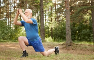 4 At-Home Fitness Tests for Aging and Longevity https://www.freepik.com/free-photo/outdoor-image-active-senior-man-running-shoes-stepping-forward-doing-lunges-keeping-hands-together-front-his-face-attractive-healthy-male-pensioner-stretching-leg-muscles-forest_11892890.htm#fromView=search&page=1&position=18&uuid=c88209b6-6df6-4433-b17c-46cf22c60619&query=senior+stretching