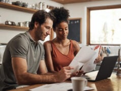 https://www.freepik.com/premium-photo/our-debt-is-almost-paid-off-cropped-shot-couple-using-their-laptop-going-through-paperwork-home_26983092.htm#from_element=cross_selling__photo