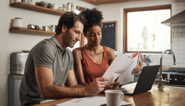 https://www.freepik.com/premium-photo/our-debt-is-almost-paid-off-cropped-shot-couple-using-their-laptop-going-through-paperwork-home_26983092.htm#from_element=cross_selling__photo