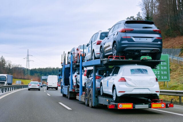 7874 https://www.freepik.com/premium-photo/car-carrier-transporter-truck-road-auto-vehicles-hauler-driveway-european-transport-logistics-haulage-work-transportation-heavy-haul-trailer-with-driver-highway_23687565.htm#fromView=search&page=1&position=8&uuid=a5407dd8-a5c7-4ba8-8e09-c2da32c43896&query=car+hauler