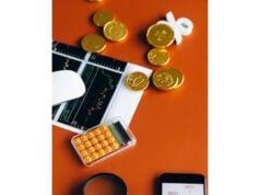 https://www.pexels.com/photo/orange-calculator-on-the-table-6120253/