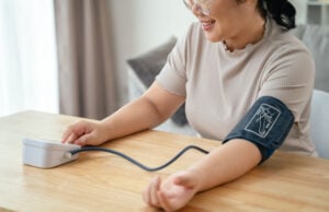 https://www.vecteezy.com/photo/68587478-asian-woman-uses-portable-blood-pressure-monitor-in-her-living-room-health-awareness-concept