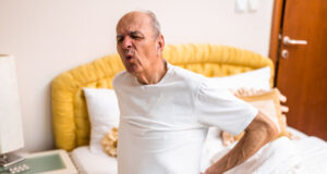 https://www.vecteezy.com/photo/67187819-caucasian-senior-male-with-a-gray-hair-having-pain-in-back-after-waking-up-and-sitting-on-bed-in-the-morning-representing-physical-injury-or-muscle-strain-in-older-age