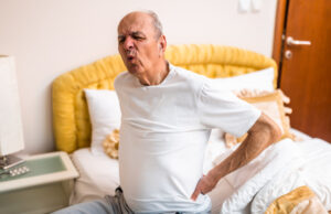 https://www.vecteezy.com/photo/67187819-caucasian-senior-male-with-a-gray-hair-having-pain-in-back-after-waking-up-and-sitting-on-bed-in-the-morning-representing-physical-injury-or-muscle-strain-in-older-age