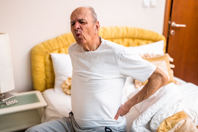 small-vecteezy_caucasian-senior-male-with-a-gray-hair-having-pain-in-back_67187819_small https://www.vecteezy.com/photo/67187819-caucasian-senior-male-with-a-gray-hair-having-pain-in-back-after-waking-up-and-sitting-on-bed-in-the-morning-representing-physical-injury-or-muscle-strain-in-older-age