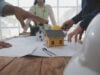 https://www.vecteezy.com/photo/40995828-construction-and-structure-concept-of-engineer-or-architect-meeting-for-project-working-with-partner-and-engineering-tools-on-model-building-and-blueprint-in-working-site-contract-for-both-companies
