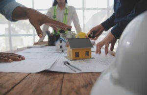 https://www.vecteezy.com/photo/40995828-construction-and-structure-concept-of-engineer-or-architect-meeting-for-project-working-with-partner-and-engineering-tools-on-model-building-and-blueprint-in-working-site-contract-for-both-companies