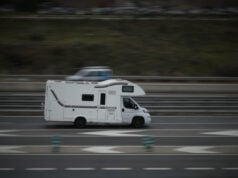 https://www.vecteezy.com/photo/55650509-passenger-car-white-on-the-highway-in-motion-with-a-blurred-background