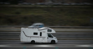 https://www.vecteezy.com/photo/55650509-passenger-car-white-on-the-highway-in-motion-with-a-blurred-background