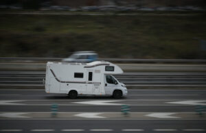 https://www.vecteezy.com/photo/55650509-passenger-car-white-on-the-highway-in-motion-with-a-blurred-background