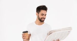 https://www.magnific.com/premium-photo/image-handsome-satisfied-man-drinking-coffee-takeaway-reading-newspaper-isolated-white-wall_17469799.htm#from_element=cross_selling__photo