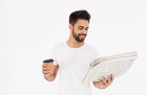 https://www.magnific.com/premium-photo/image-handsome-satisfied-man-drinking-coffee-takeaway-reading-newspaper-isolated-white-wall_17469799.htm#from_element=cross_selling__photo