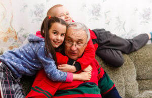 https://www.magnific.com/premium-photo/grandfather-spends-time-with-grandchildren-living-room_26657884.htm#from_element=cross_selling__photo