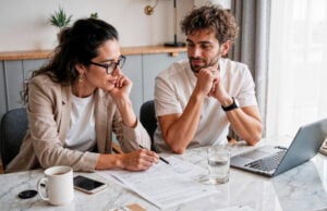 https://www.magnific.com/free-photo/focused-colleagues-analyzing-documents-desk-with-laptop_395593213.htm#fromView=search&page=1&position=24&uuid=b519ef45-05c5-47fa-83f4-cc067f589300&query=young+couple+planning+retirement
