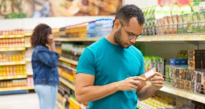 https://www.magnific.com/free-photo/focused-african-american-man-reading-information-packaging_6628374.htm#fromView=search&page=1&position=9&uuid=8c3c662f-6cdb-4313-ae53-907b5a59f9ef&query=shopper+looking+at+price+tags