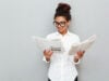 https://www.magnific.com/free-photo/cheerful-business-woman-standing-grey-wall-with-newspapers_7337953.htm#fromView=search&page=1&position=3&uuid=5e5534c7-bdaa-4fbb-804a-b26dc309b903&query=person+newspapers