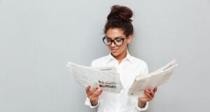 https://www.magnific.com/free-photo/cheerful-business-woman-standing-grey-wall-with-newspapers_7337953.htm#fromView=search&page=1&position=3&uuid=5e5534c7-bdaa-4fbb-804a-b26dc309b903&query=person+newspapers